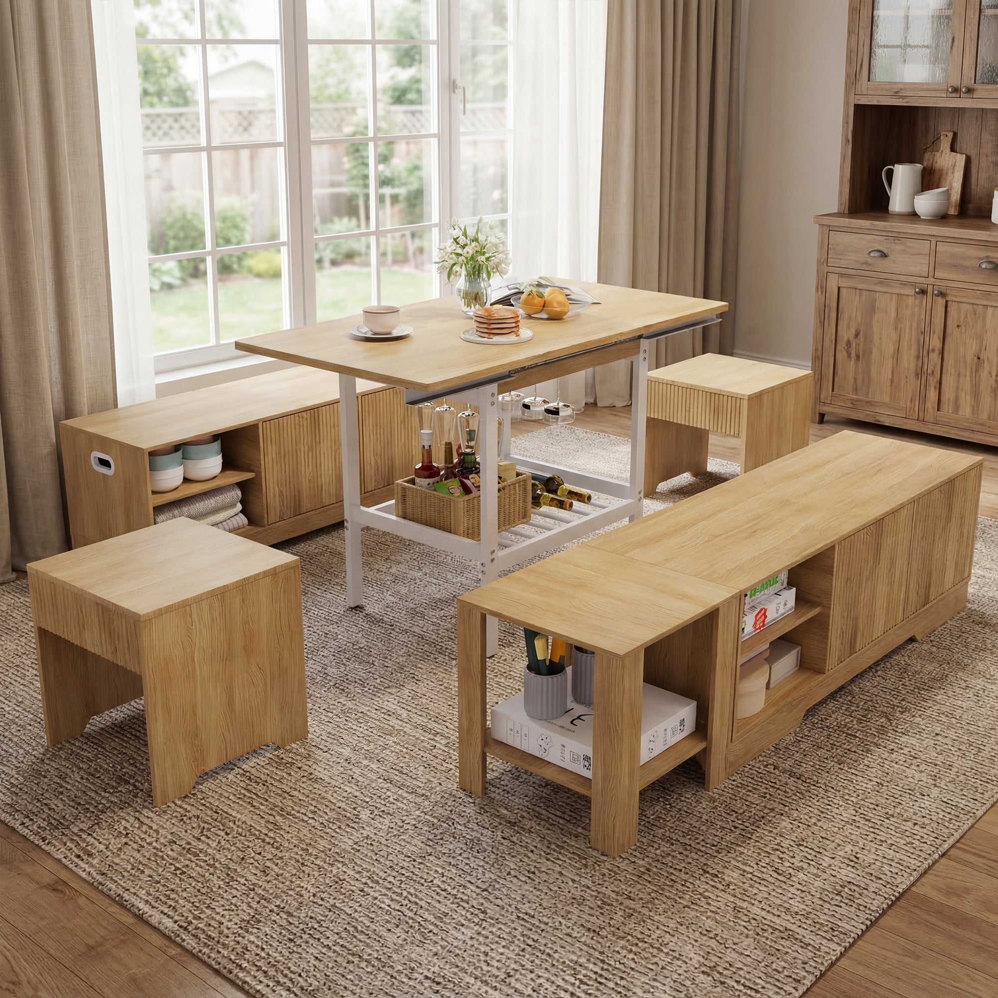 Wooden furniture set including a table, benches, and storage units in a room with large windows.