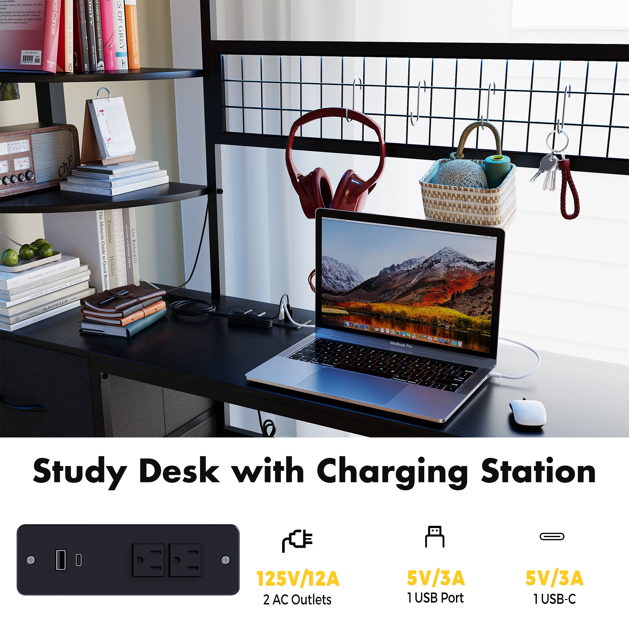Study desk with charging station featuring a laptop, books, and stationery items.
