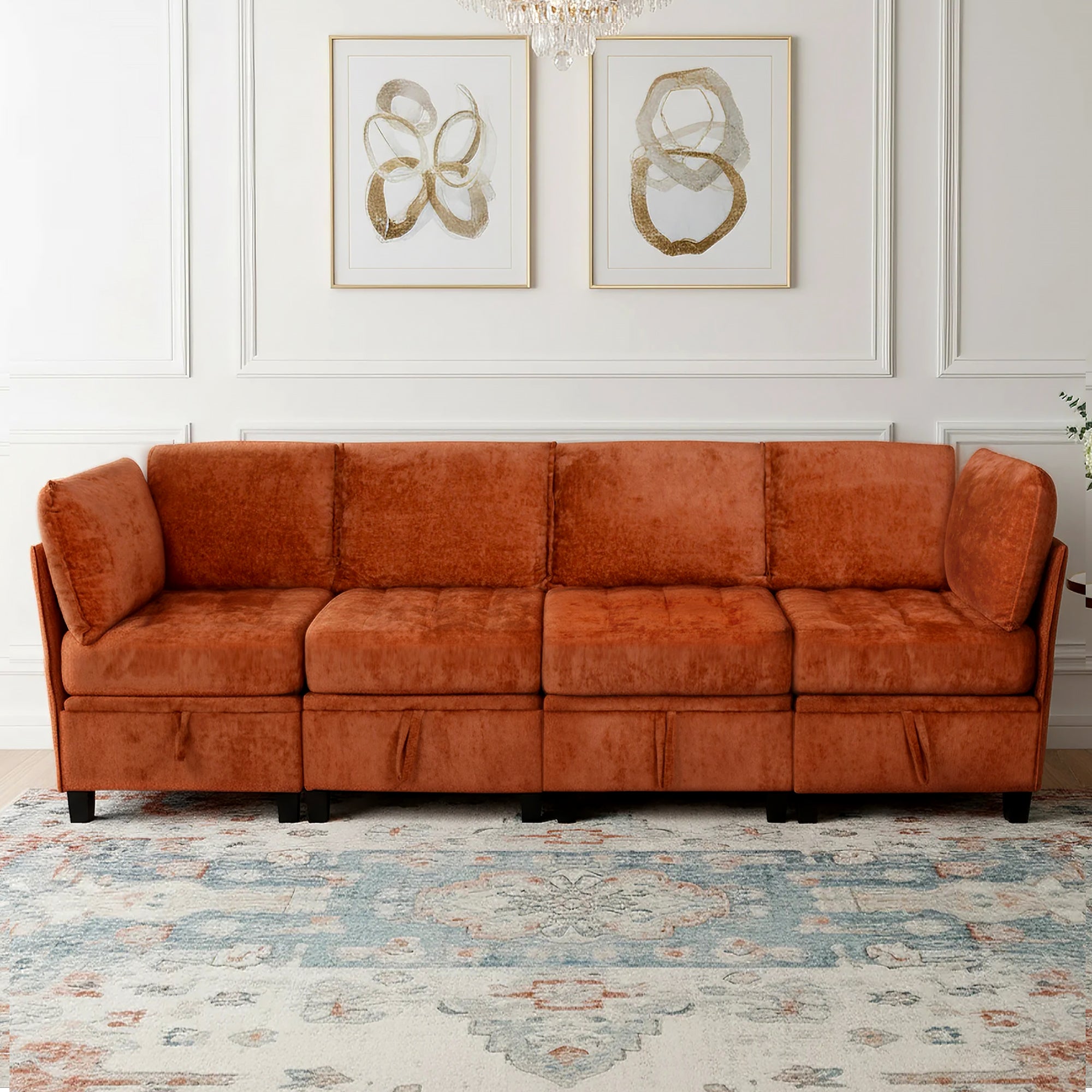 Brown sofa in a living room with decorative wall art and a patterned rug.