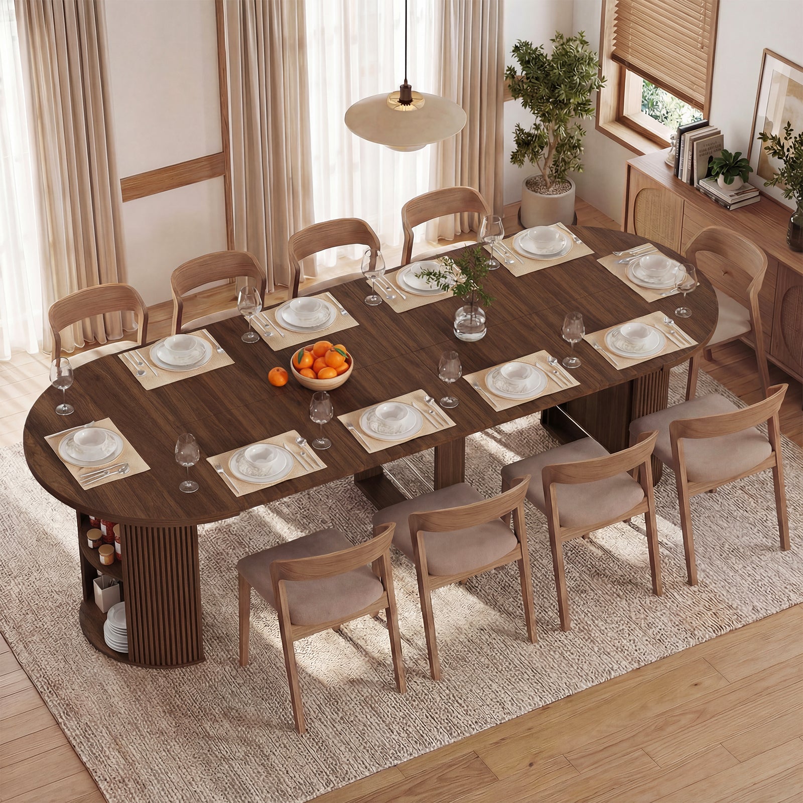 Dining room with a large wooden table set for dinner, surrounded by chairs.
