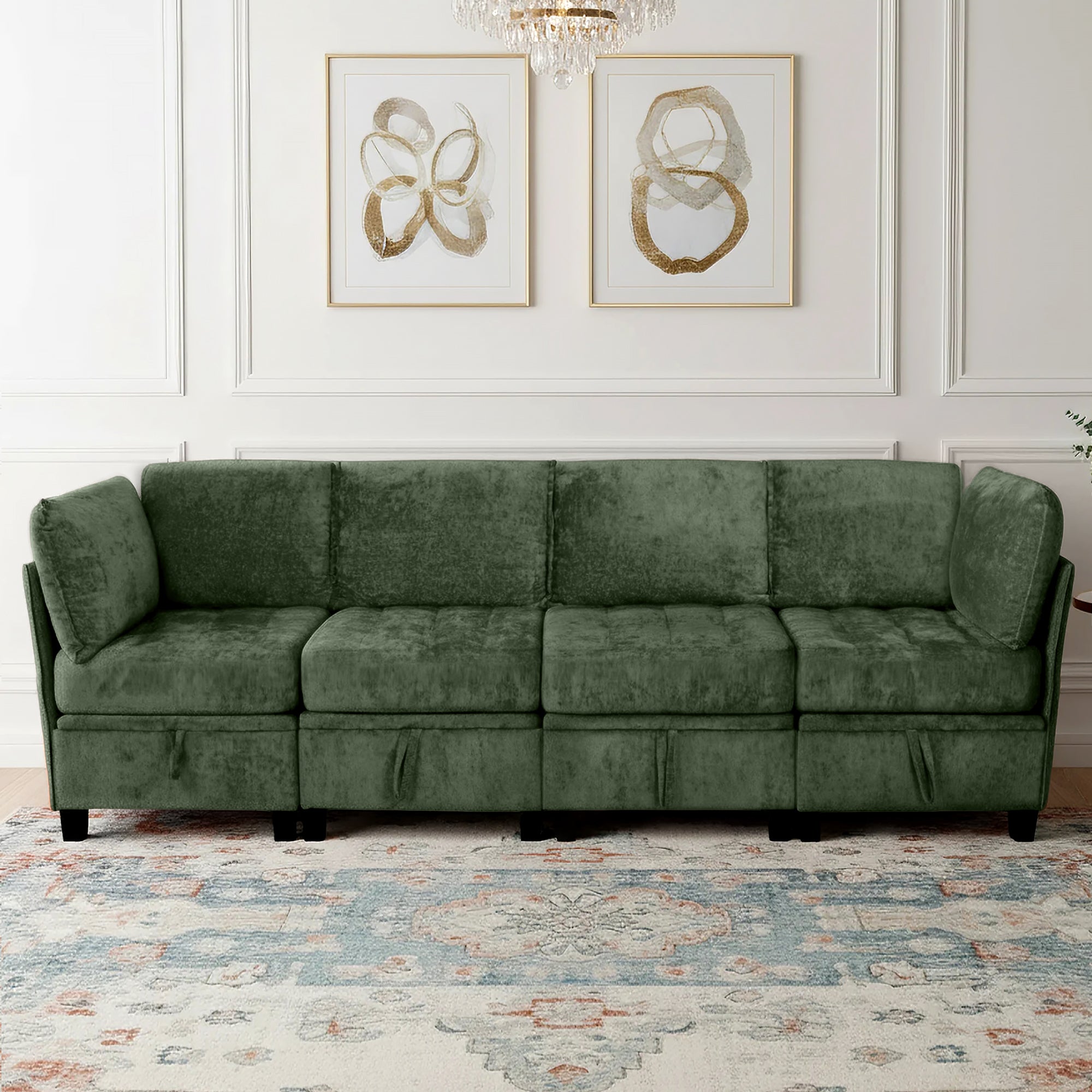 Green sofa in a room with decorative wall art and a patterned rug.