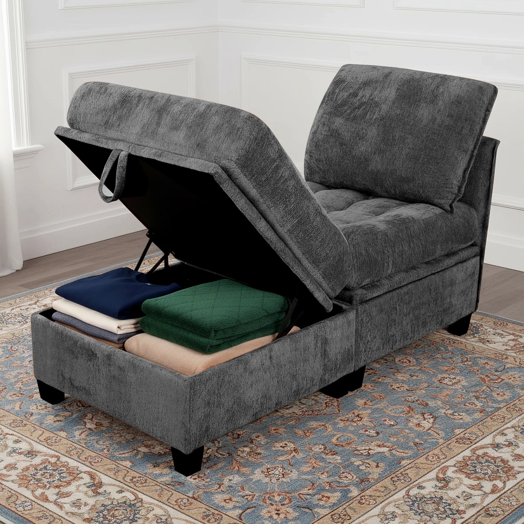 Gray upholstered chair with storage compartment on a patterned rug.