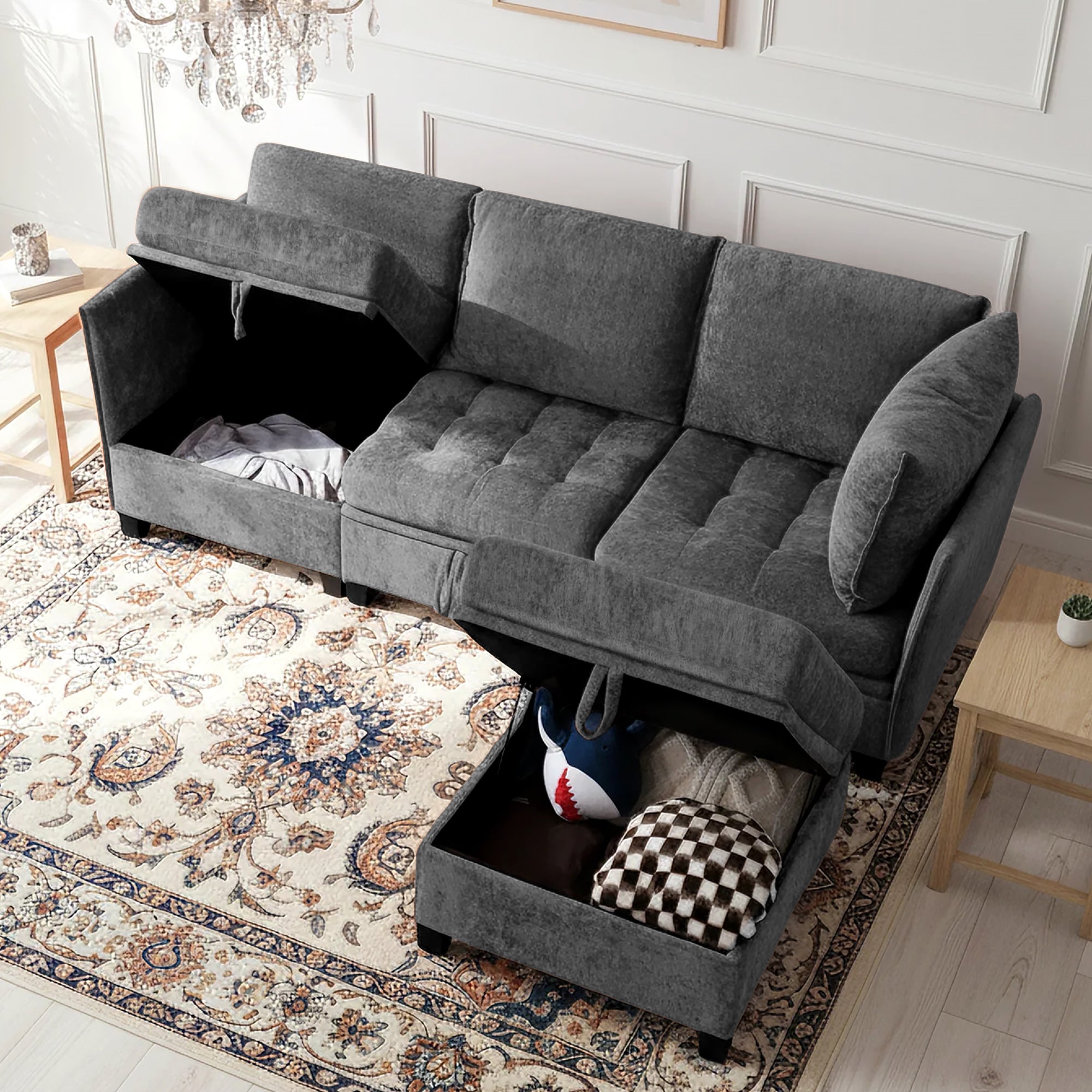 Gray sectional sofa with storage drawers in a living room setting