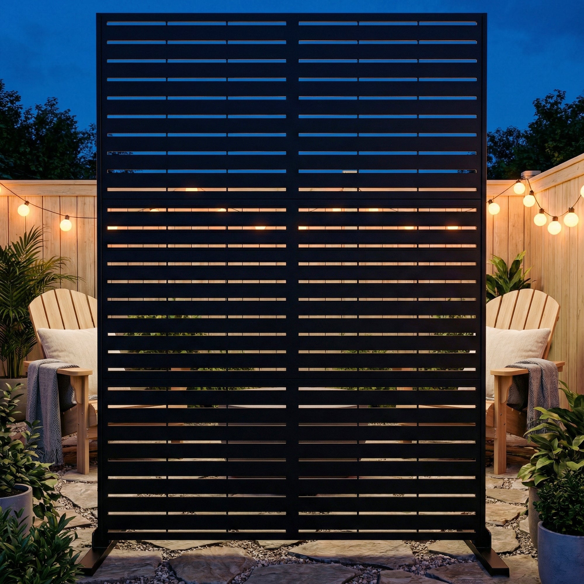 Black slatted screen in an outdoor setting with chairs and plants.