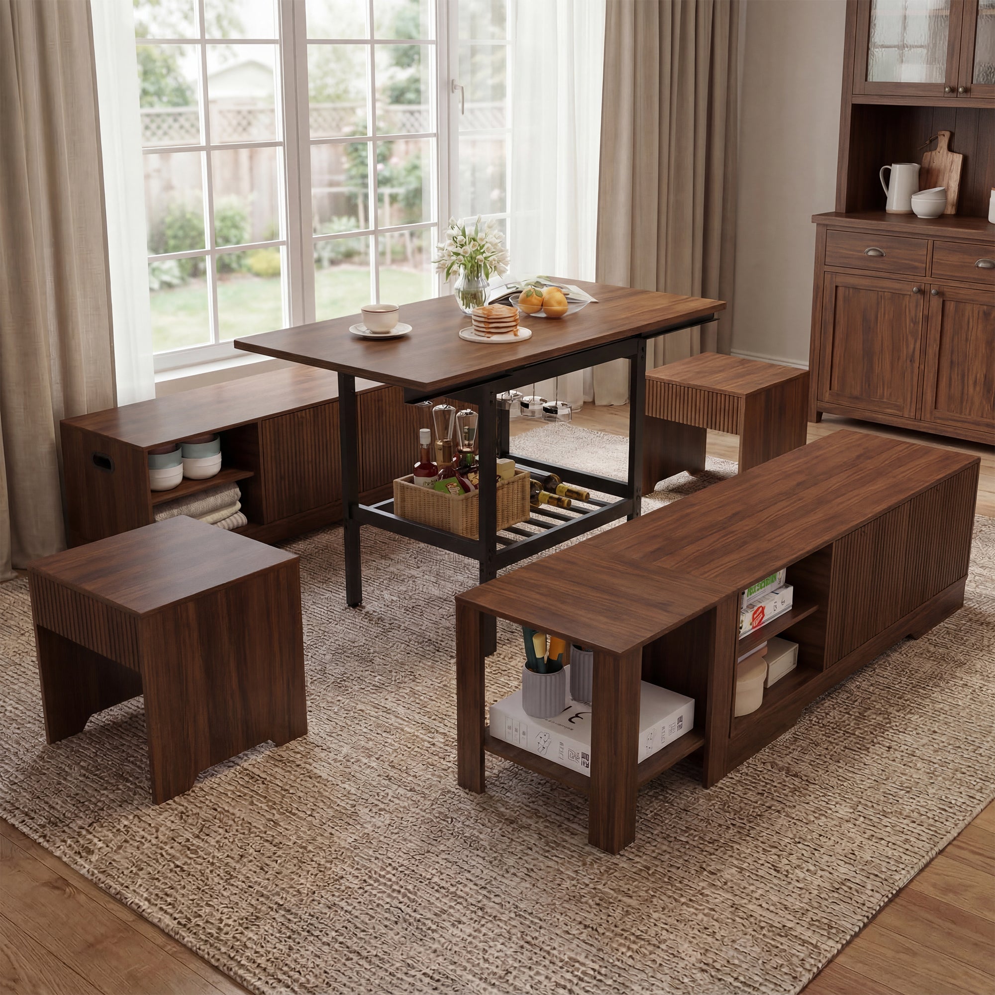 Wooden dining set with table, benches, and cabinets in a room with large windows.