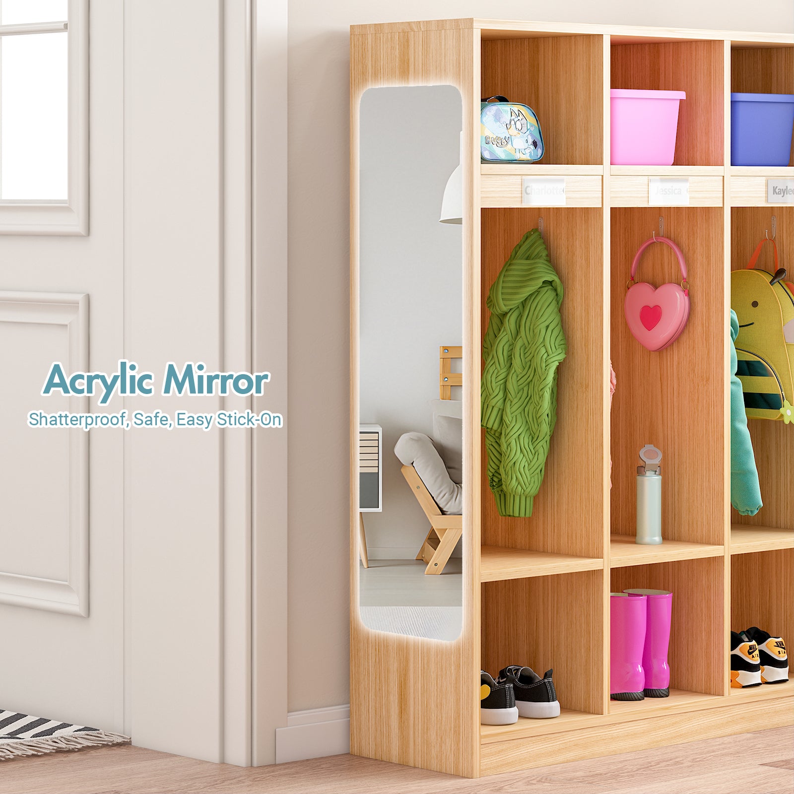 Wooden shelf with children's items and acrylic mirror on a white wall.