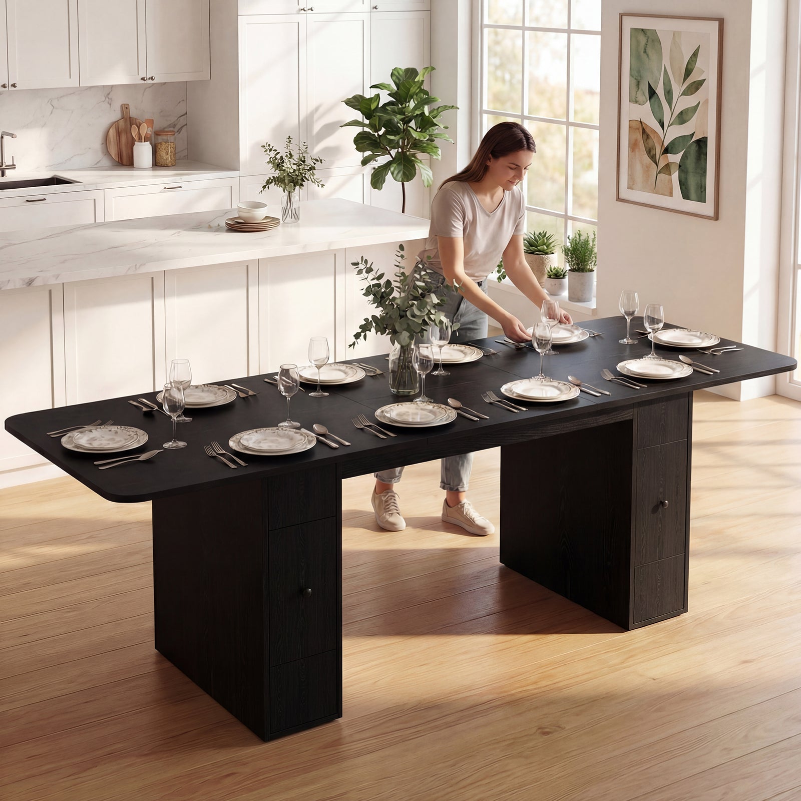 Woman setting a table in a modern kitchen with a black dining table.
