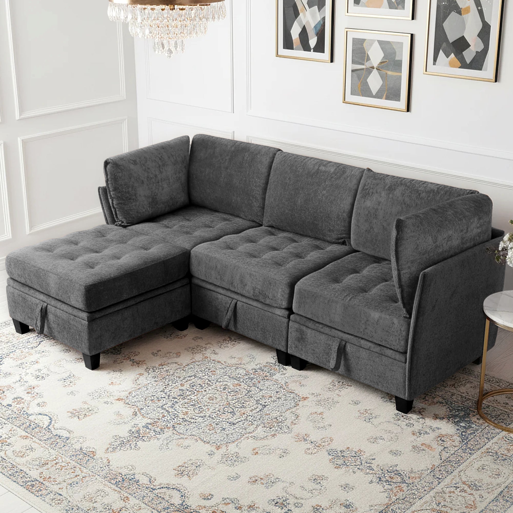 Gray sectional sofa in a living room setting with decorative elements.
