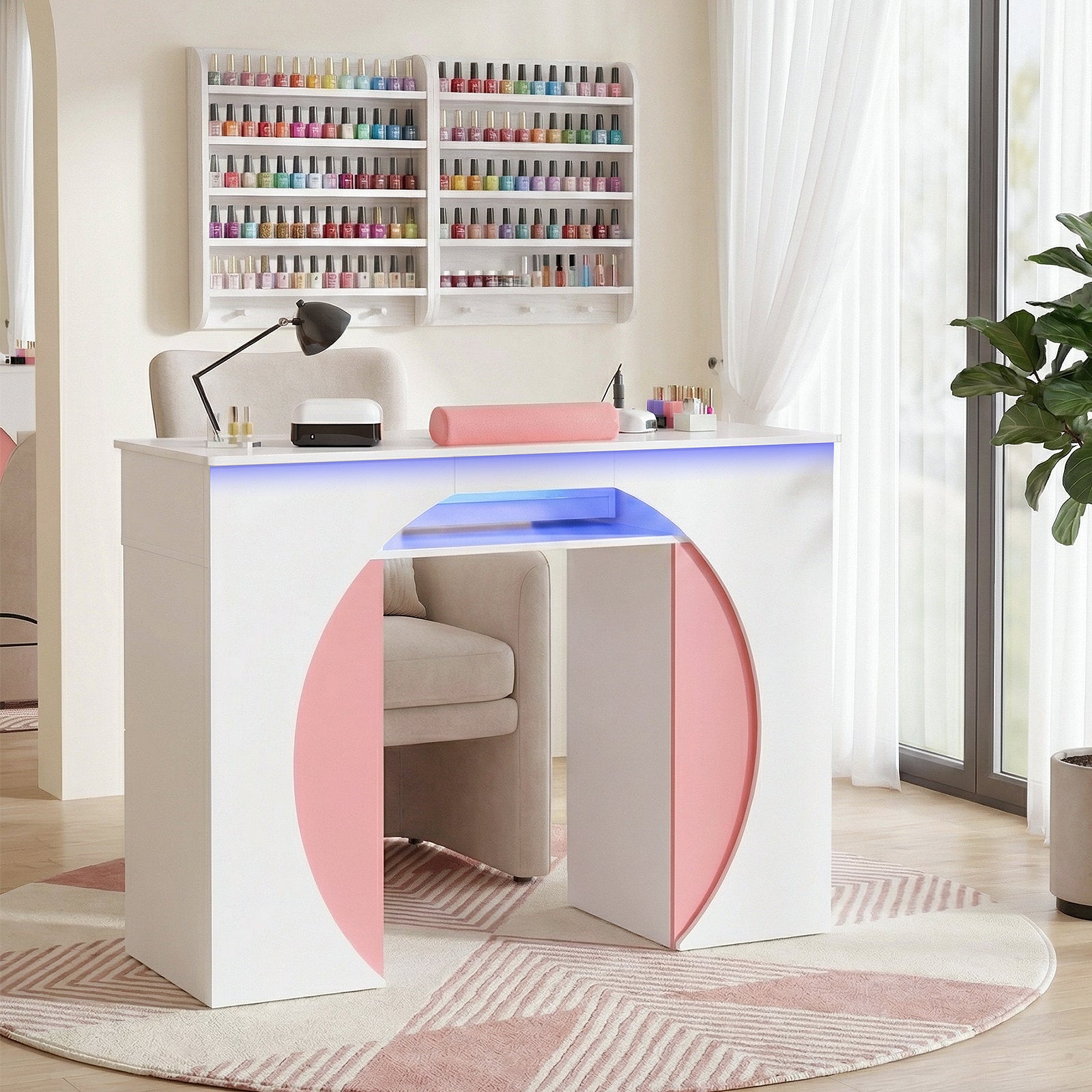 Modern nail salon desk with colorful nail polish shelves in a bright room.