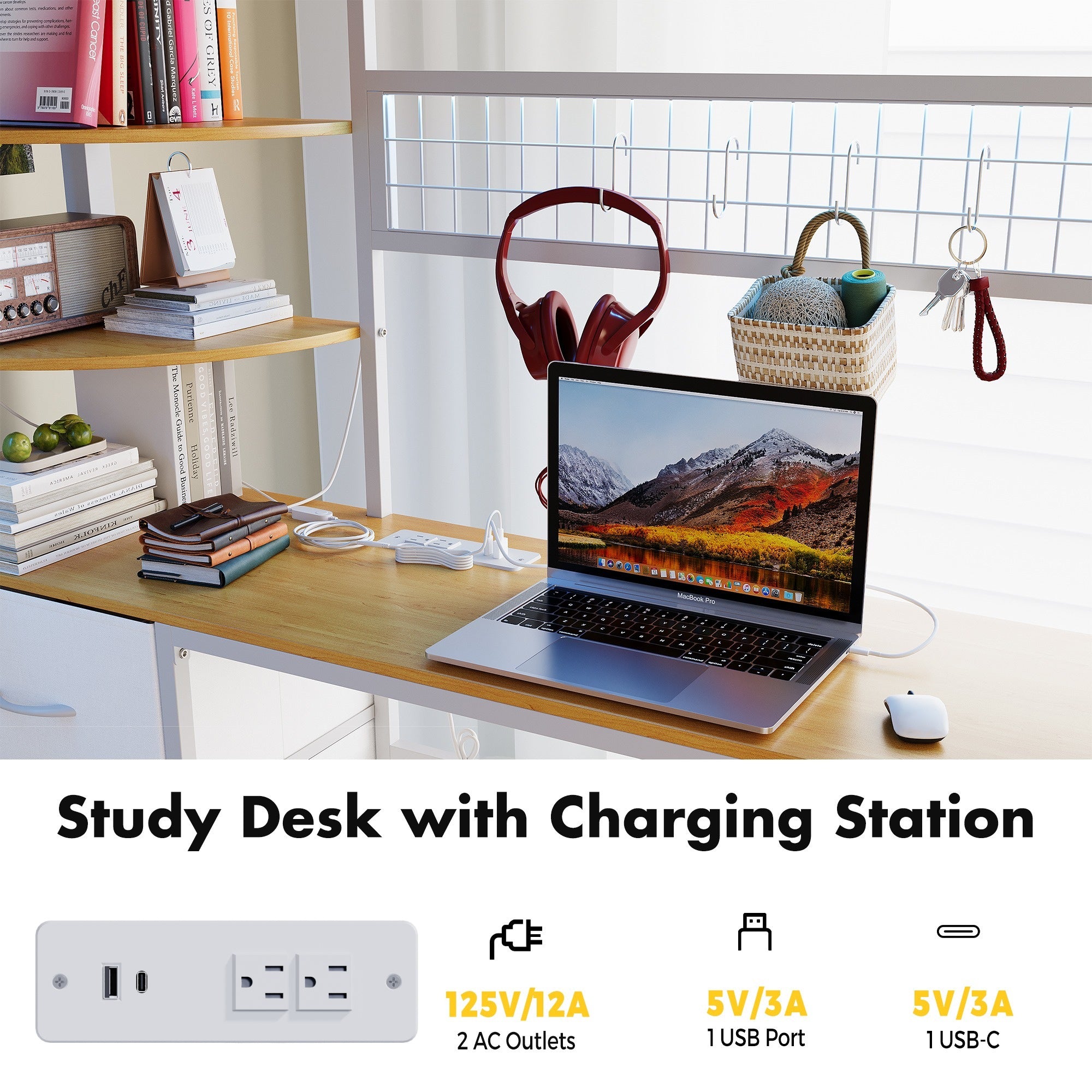 Study desk with charging station featuring a laptop, books, and stationery items.