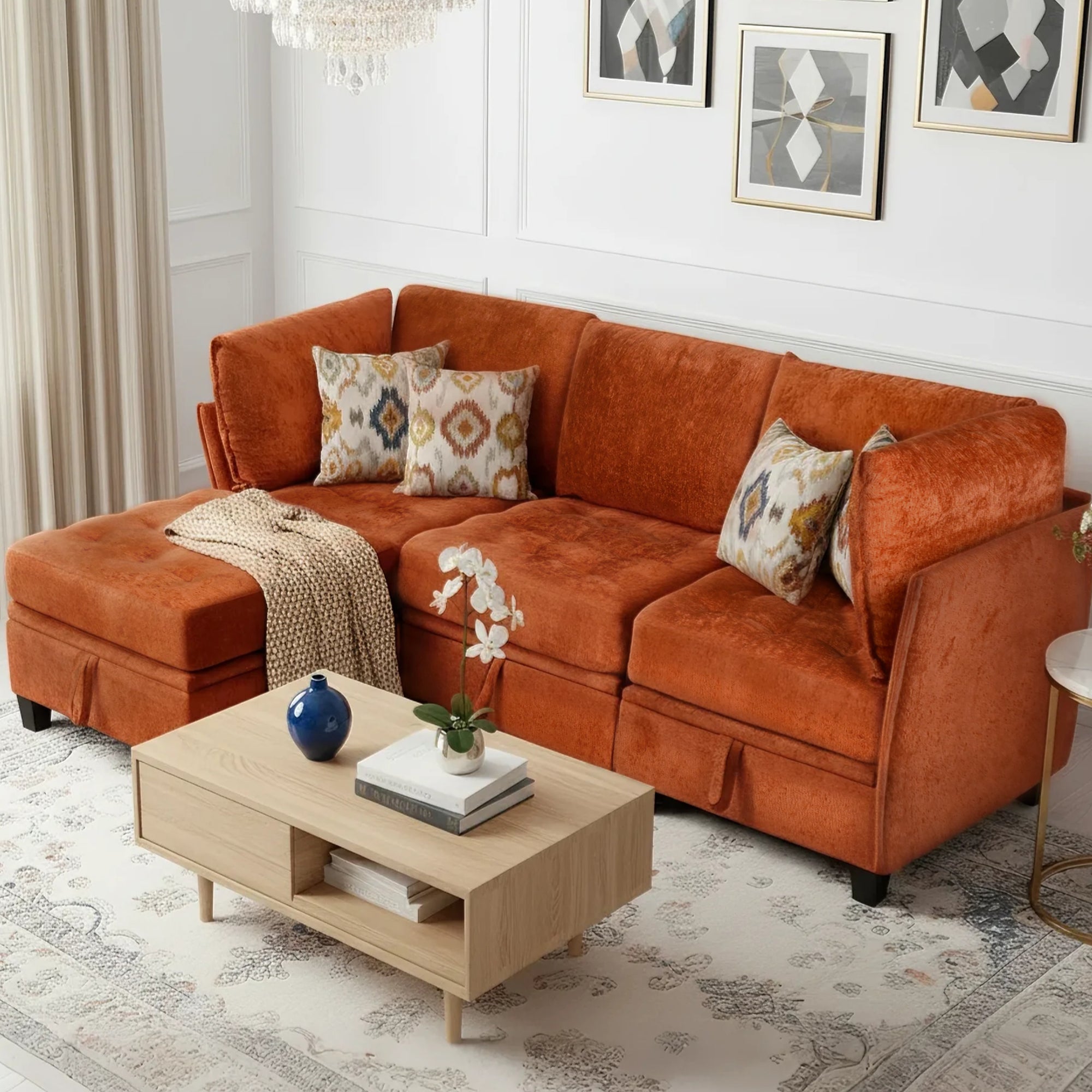 Orange sectional sofa in a living room with a coffee table and decorative items.