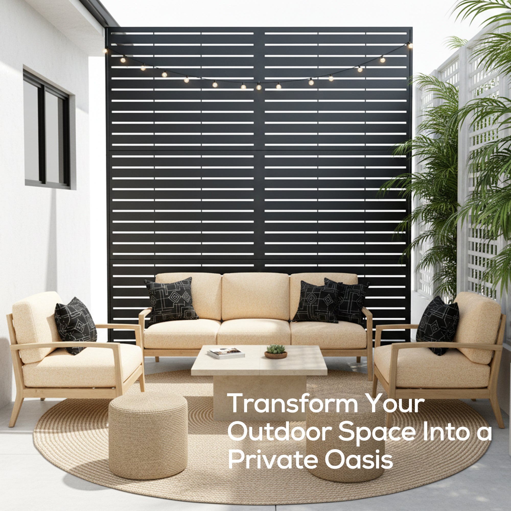Outdoor furniture set with beige sofa, chairs, and ottoman in front of a black privacy screen.